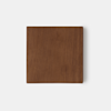 A rectangular block of wood with a smooth surface and visible natural grain, photographed against a plain white background.