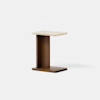 A modern side table with a light rectangular top, a vertical wooden support, and a darker rectangular wooden base, set against a plain white background.
