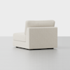 A modern, armless, light beige upholstered sectional sofa piece with clean lines, shown against a plain white background. The sofa has a thick seat cushion and a slightly angled backrest.