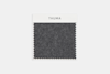 A square swatch of dark gray fabric with zigzag-cut edges, displayed on a plain white background.
