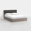 A modern platform bed with a wooden frame, white bedding, two pillows, and a dark upholstered headboard, set against a plain white background.