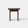 A small, dark brown wooden table with a rectangular top and four straight legs, set against a plain white background.