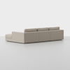 A modern, light beige sectional sofa with clean lines and low backrests, viewed from the back against a plain white background.