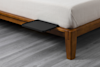 The Tray in Matte Black Color Placed on Bed