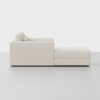A modern, light beige sectional sofa with plush cushions and an attached chaise lounge, shown from the side against a plain white background.