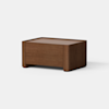 A modern, rectangular wooden side table with a smooth finish and minimalist design, set against a plain white background.