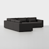 A modern, dark gray sectional sofa with clean lines and plush cushions, placed on a plain white background. The sofa features wide armrests and a spacious seating area.