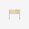 A simple, light wood headboard with a rectangular panel design and straight legs, photographed against a plain white background.