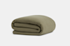 A neatly folded, olive green blanket with a subtle textured pattern, placed on a plain white background.