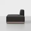 A modern, armless black upholstered sofa seat with a wooden base, photographed from the side against a plain white background.