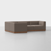 A modern, L-shaped sectional sofa with brown upholstery and a wooden base, set against a plain white background.