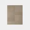 A rectangular rug featuring four large, textured sections in varying shades of beige and taupe, arranged in a simple geometric pattern on a white background.