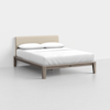 A modern bed with a light beige upholstered headboard, white bedding, two pillows, and a light wood frame, set against a plain white background.