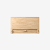 A rectangular wooden wall-mounted fold-down desk with a light natural finish, shown in the closed position against a plain white background.