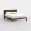 A modern wooden bed frame with angled legs, a dark upholstered headboard, and white bedding with two pillows, placed in a minimalist room with a light gray floor and white walls.