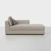 A modern beige chaise lounge with clean lines, low backrest on the left, two square cushions, and minimalist design, set against a plain white background.