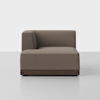 A modern, brown upholstered left-arm chaise lounge with a low backrest and dark wooden base, set against a plain white background.