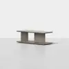 A modern rectangular coffee table with a flat top, two vertical supports, and a flat base, all in a light gray wood finish, set against a plain white background.