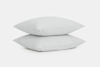 The Bed with Percale Sheet Set in Stone Color and Stacked Pillows
