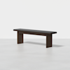 A modern wooden bench with a dark, rectangular seat and thick, straight legs, set against a plain white background.