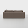 A modern, brown, L-shaped sectional sofa is shown from the back against a plain white background. The sofa has clean lines and plush back cushions.