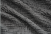 Close-up of textured, dark gray fabric with a crinkled, wavy pattern running horizontally and diagonally across the surface. The material appears soft and has visible folds and shadows.