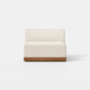 A modern armless sofa with light beige upholstery and a wooden base, positioned on a light gray floor against a plain white background.