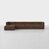 A modern, low-profile sectional sofa in brown fabric with a left-facing chaise lounge, set against a plain white background and a light gray floor.