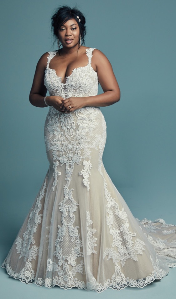 This elegant fit and flare wedding  dress  offers additional 