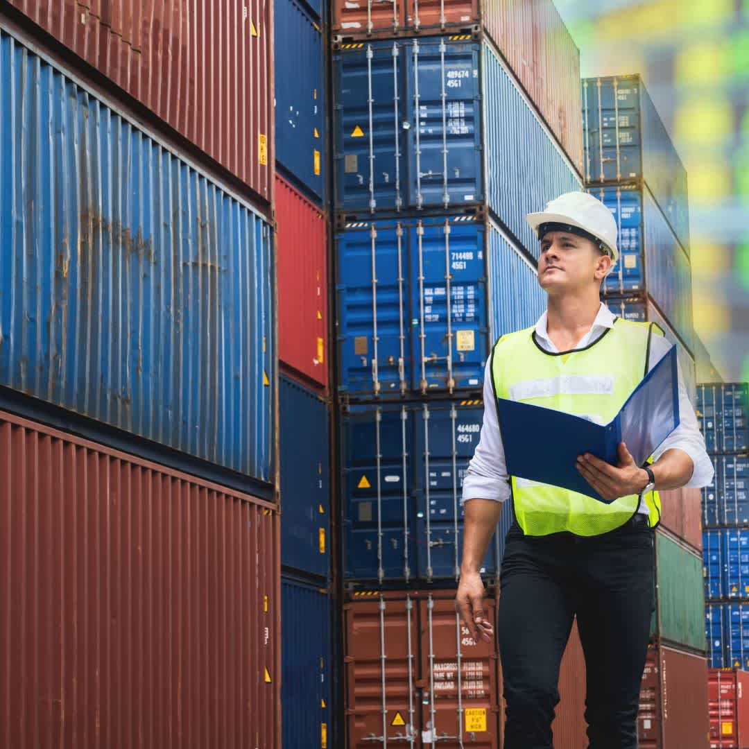Customs worker checking containers