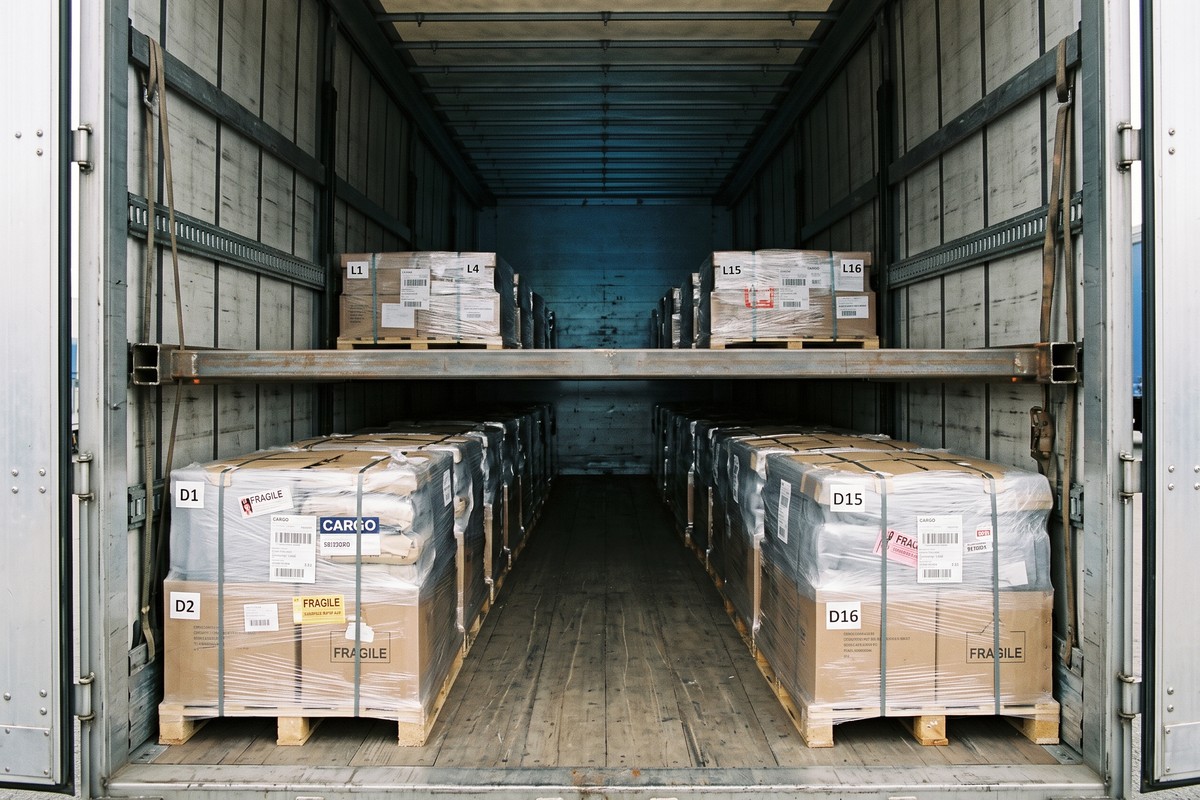 Two Fully Loaded Levels Inside a Double-Deck Loaded Truck Trailer