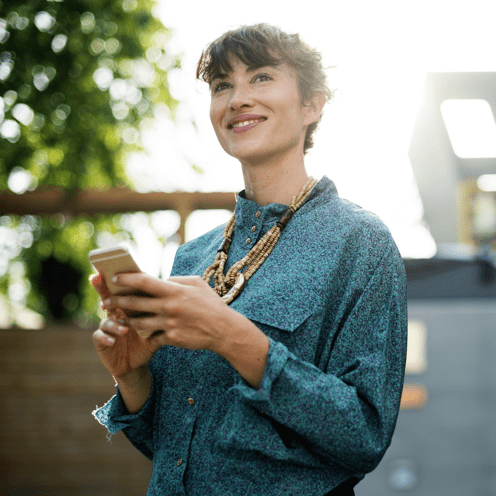 Girl with phone looking up