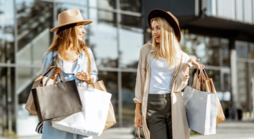 two girls shopping at retail shops