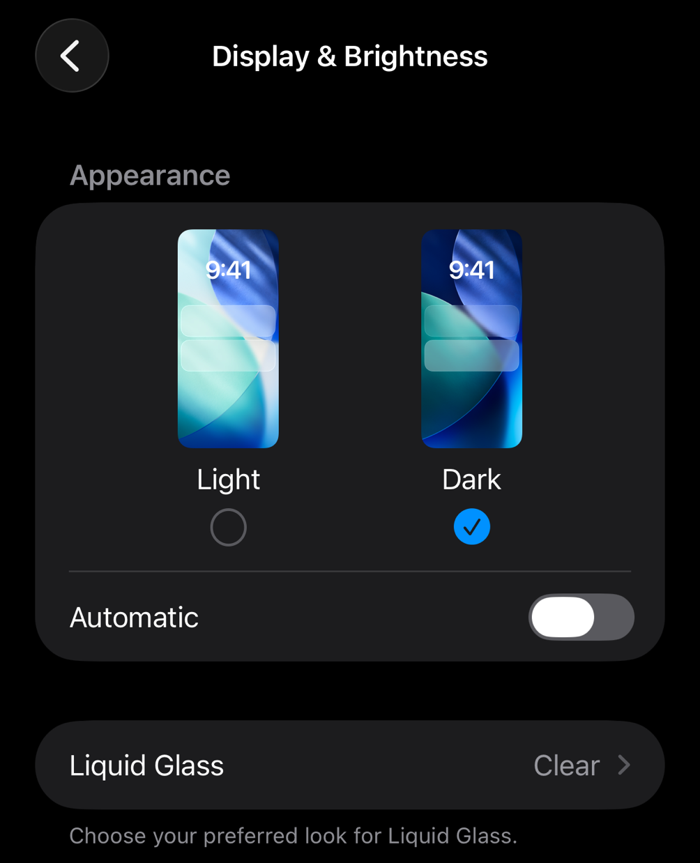 Display and Brightness Settings section with Dark Mode enabled on iOS device