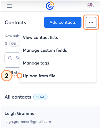 Contacts page with More menu expanded and Upload from file option selected