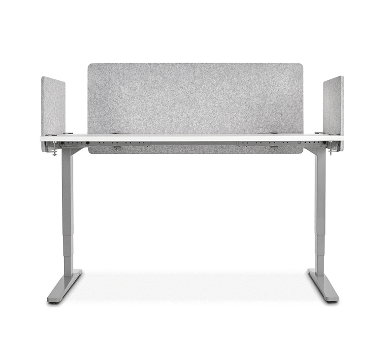 A Dual Sided Row of 60“ x 30“ White Laminate UPLIFT Standing Desks with light gray desk-mounted acoustic panels with corner inserts