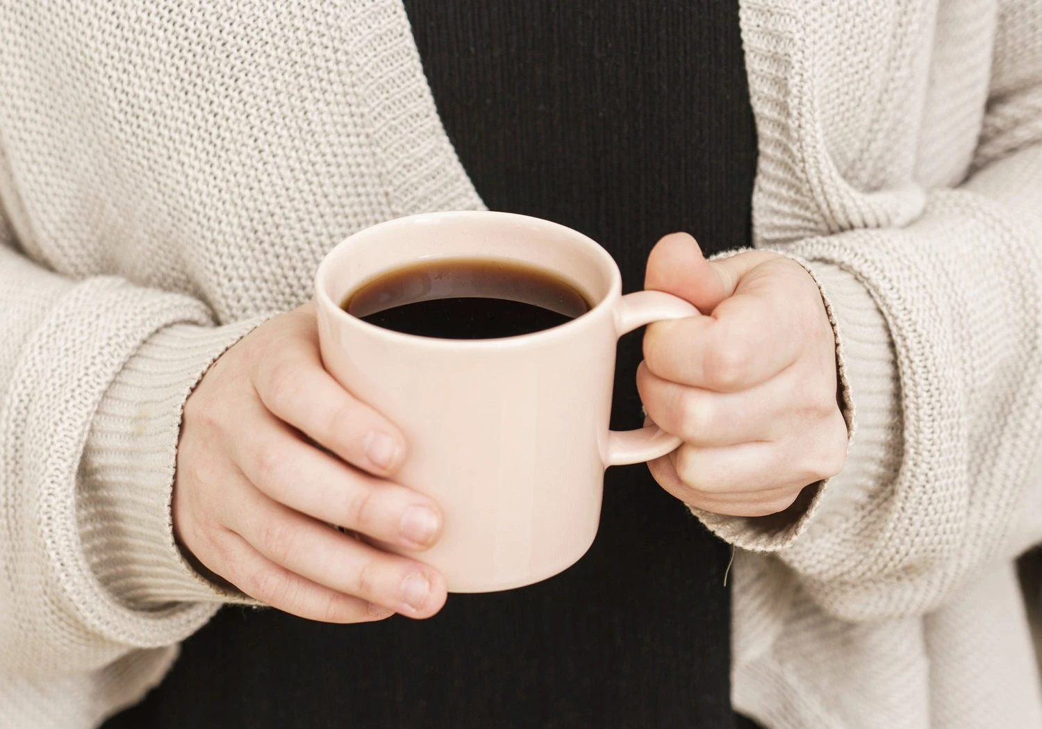 Image - holding coffee cup