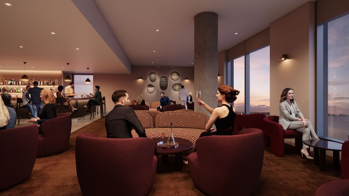 Render of the inside of the roof top bar at Crowne Plaza Geelong. People are seated around on sofa chairs and bar stools talking and drinking. 