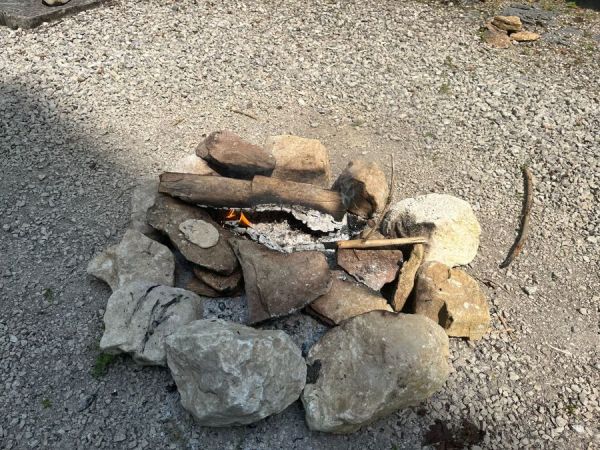 The bread is on the rock on the left. Yum.