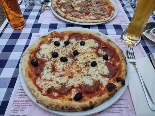 Sev's pizza in the foreground, mine in the background.