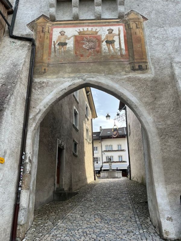 The gate to enter the medieval town of Gruyères