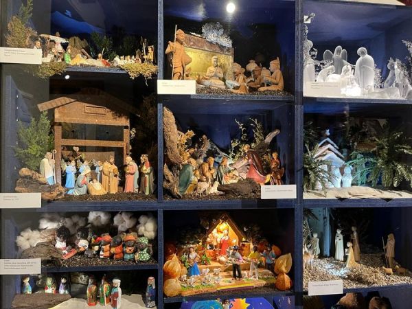 Another wall of nativity scenes.