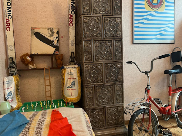 There were lots of toys and school items in the son's room.