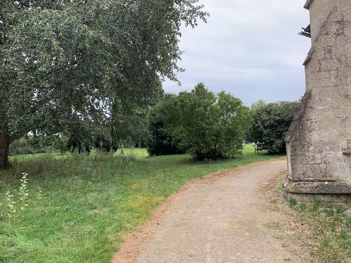 grass path to left of church