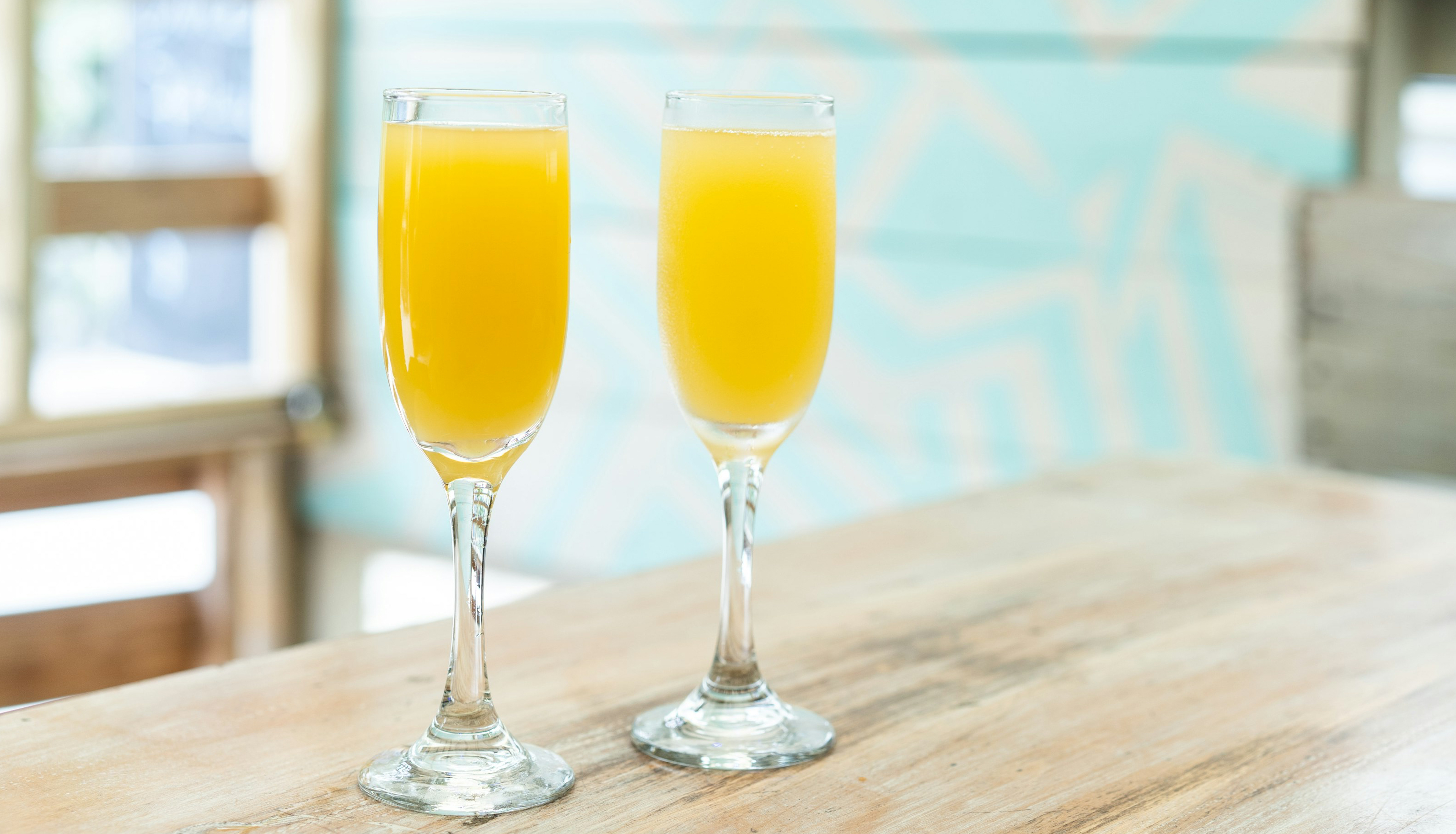 Two Mimosa cocktails