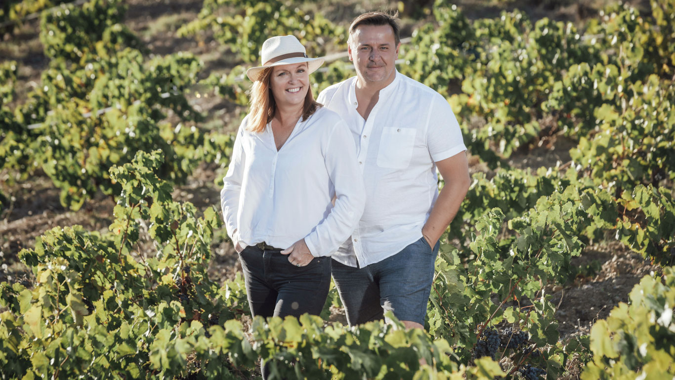 Norrel and Sharon Robertson in vineyard