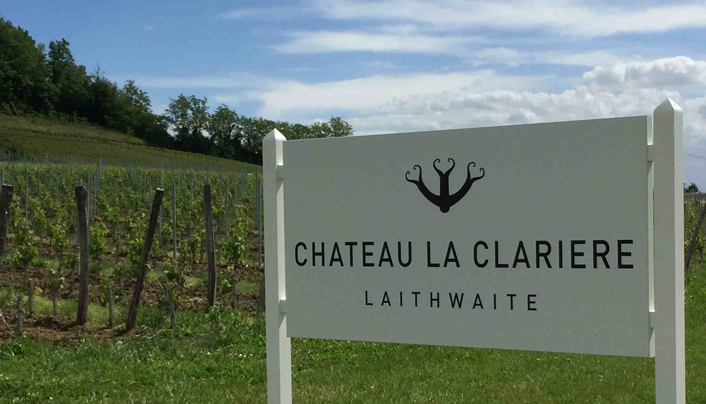 French vineyard with sign reading Chateau La Clariere