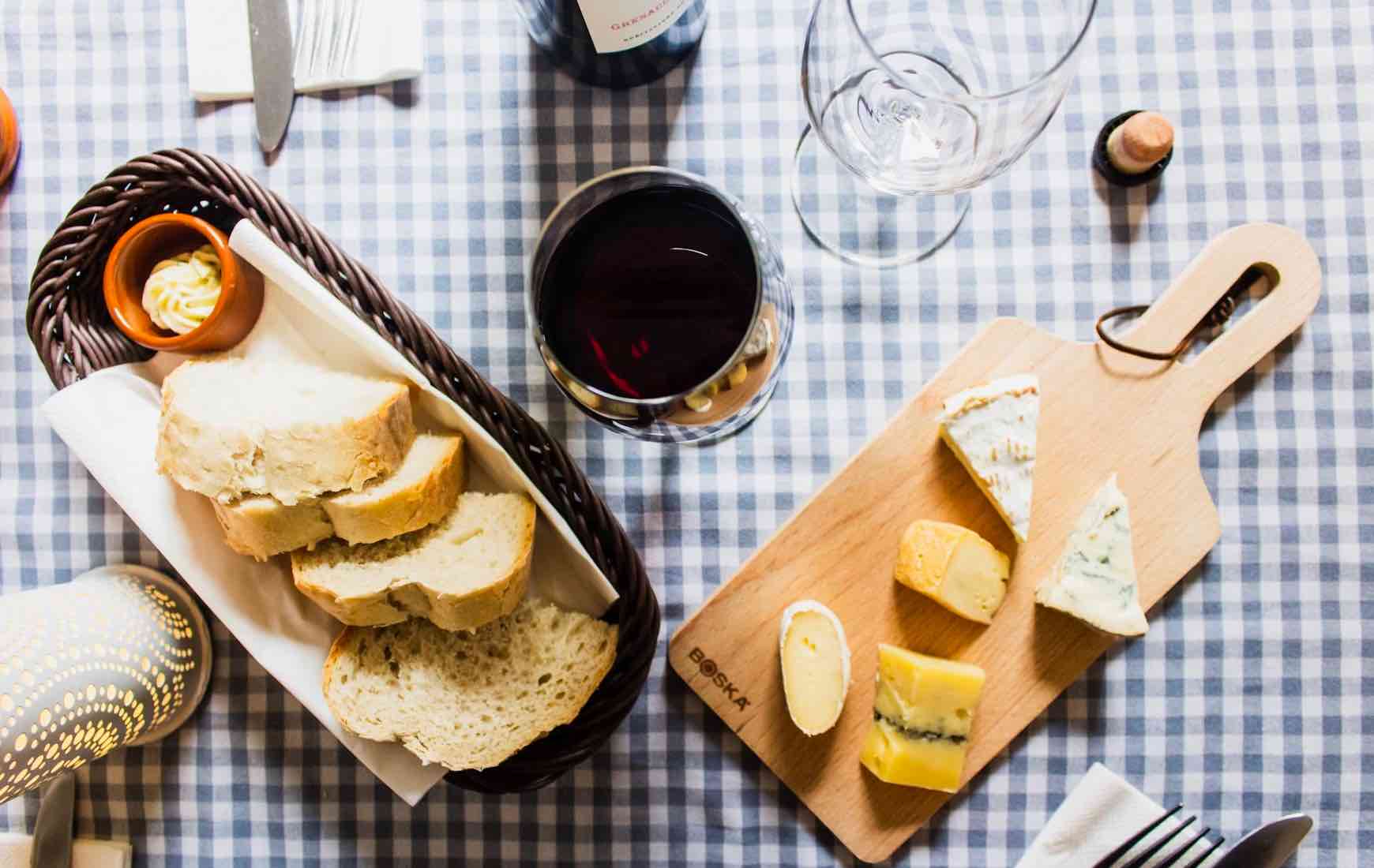 Small cheeseboard with red wine