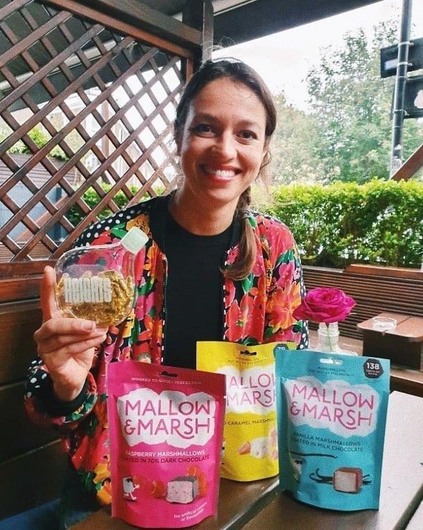 Harriot, Heights customer, holding the Smart Supplement