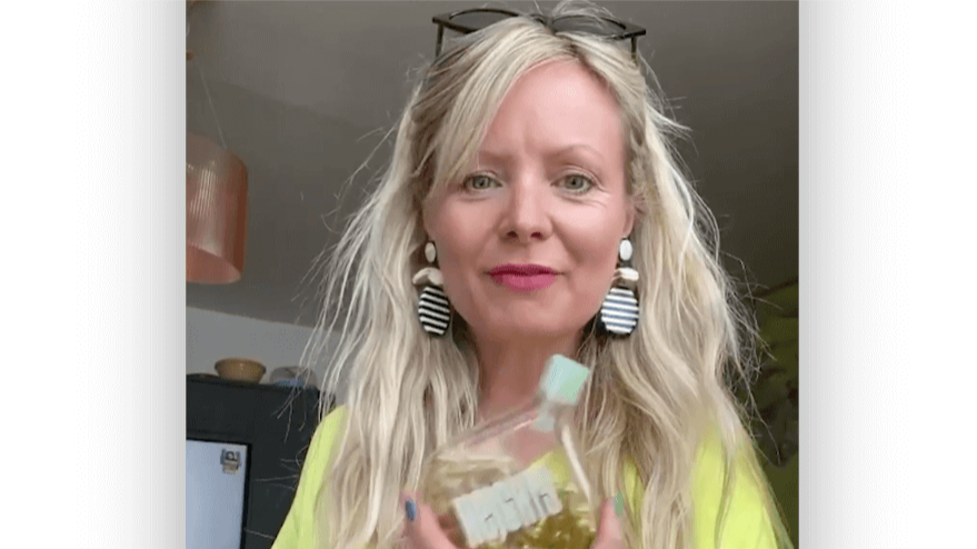 Anna, Heights customer, holding the Smart Supplement